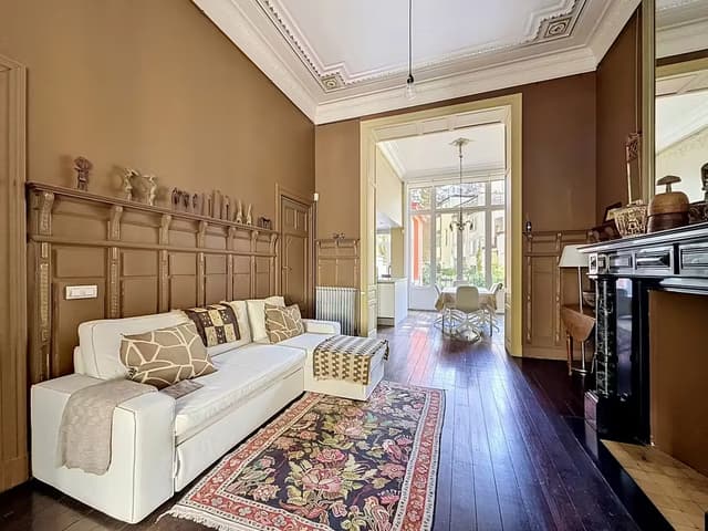Superbe duplex in een gerenoveerde neoclassicistische herenwoning