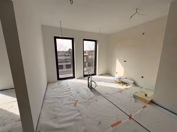 Modern appartement met drie slaapkamers en grote privétuin