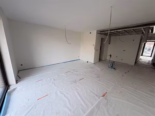 Modern gelijkvloers appartement met 1 slaapkamer en tuin
