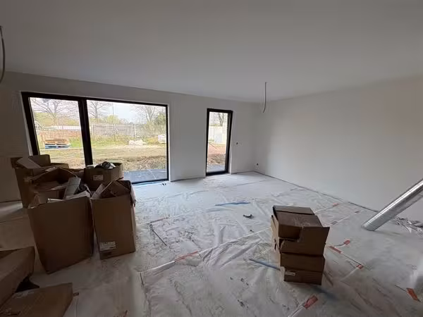 Modern gelijkvloers appartement met 2 slaapkamers en tuin